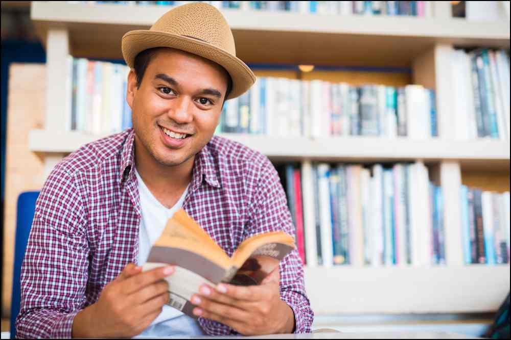 Make a favorable first impression by showing you're well read with a photo holding a book.
