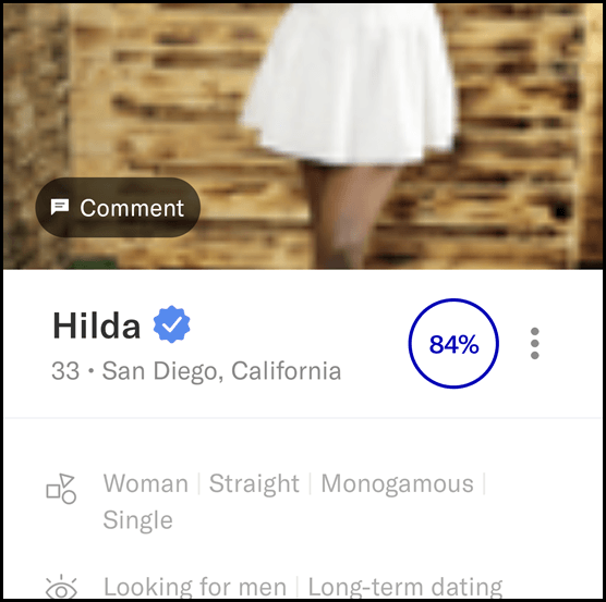 OkCupid displays a matching percentage on a woman's profile.